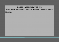 Szary ekran z tytułem BASIC ABBREVIATOR V1 i napisem READY
